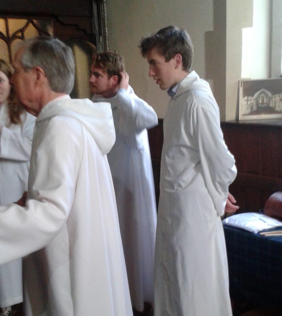 Our Sacristan, Christopher Hartley, with Augusta, Matthew and Lochie prior to Sunday Eucharist in August 2015.
