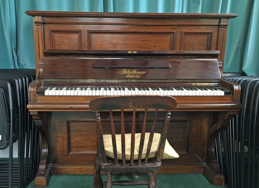 Our mellow toned Bluthner upright piano in the Refectory of St Vincent's