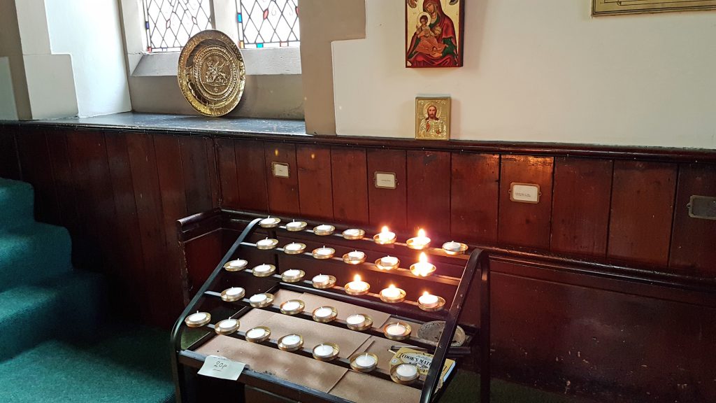 The pricket stand with its candles within St Vincent's