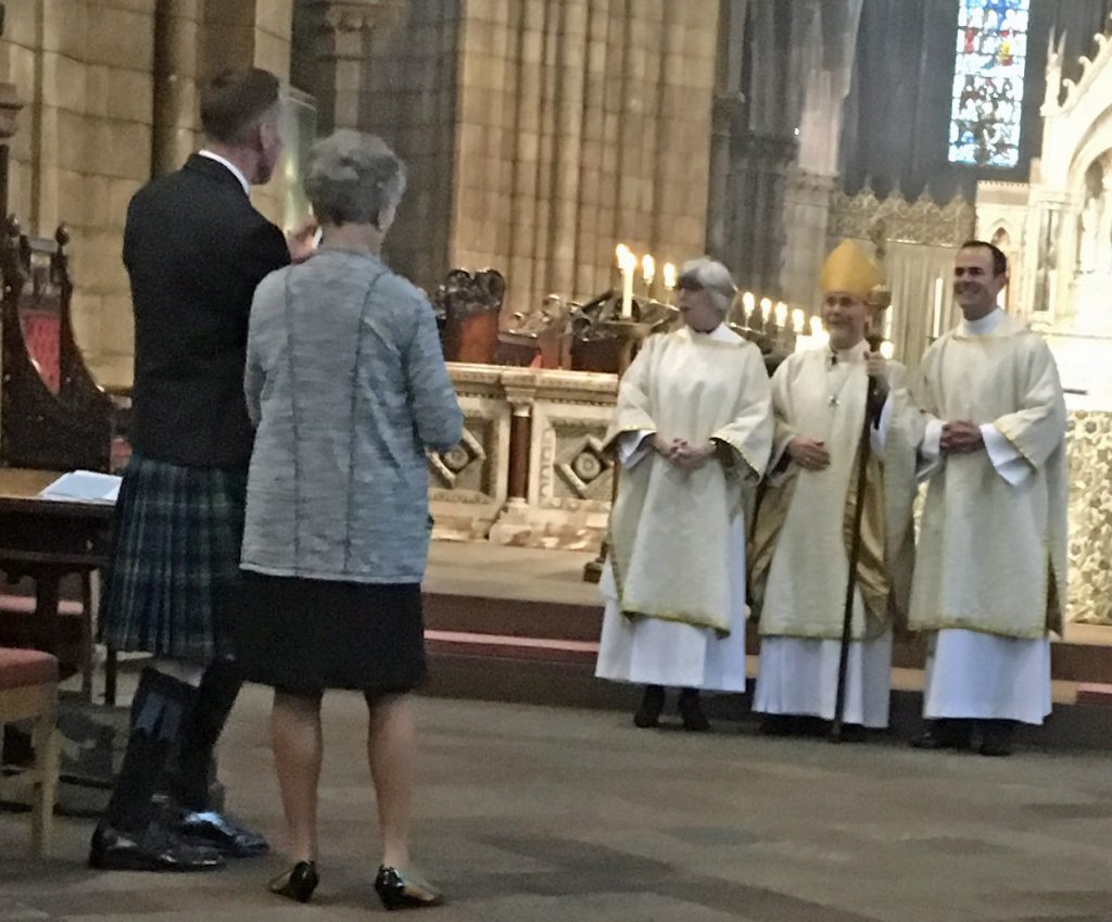 Oliver Brewer-Lennon's husband Joe and Mother, from the USA, watching Oliver who is on the right of the Bishop of Edinburgh following ordination as a deacon in the Scottish Episcopal Church on 25th September 2016. Oliver was on a research placement at St Vincent's in the Spring of 2016.
